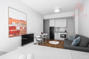 Deluxe kamer, balkon | Babybedden (toeslag), gratis wifi, beddengoed