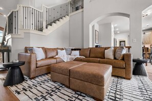 TV, fireplace, books - 3rd St Hub House at Coler Crossing Family (Bentonville)