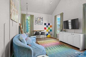 TV, fireplace, books - 3rd St Hub House at Coler Crossing Family (Bentonville)