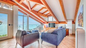 32-inch flat-screen TV with cable channels, TV