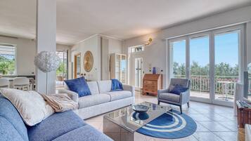 32-inch flat-screen TV with cable channels, TV