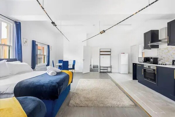 Apartamento superior | 1 dormitorio, tabla de planchar con plancha, wifi gratis