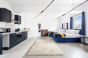 Departamento superior | 1 habitación, tabla de planchar con plancha y wifi gratis 