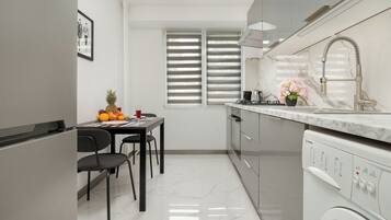 Apartment, 2 Bedrooms, Balcony | Private kitchen | Microwave, oven, coffee/tea maker, electric kettle