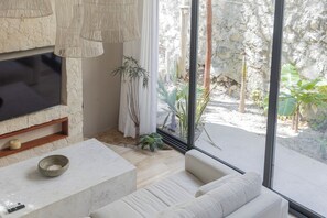 Luxury House, 4 Bedrooms, Terrace, Garden View | Living area | 50-inch Smart TV with digital channels, Netflix, streaming services - BT Homes - Zama Luxury (Tulum)