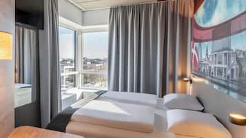 Tweepersoonskamer (French bed) | Een bureau, geluiddichte muren, gratis wifi