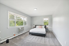 1 bedroom, desk, iron/ironing board, travel crib