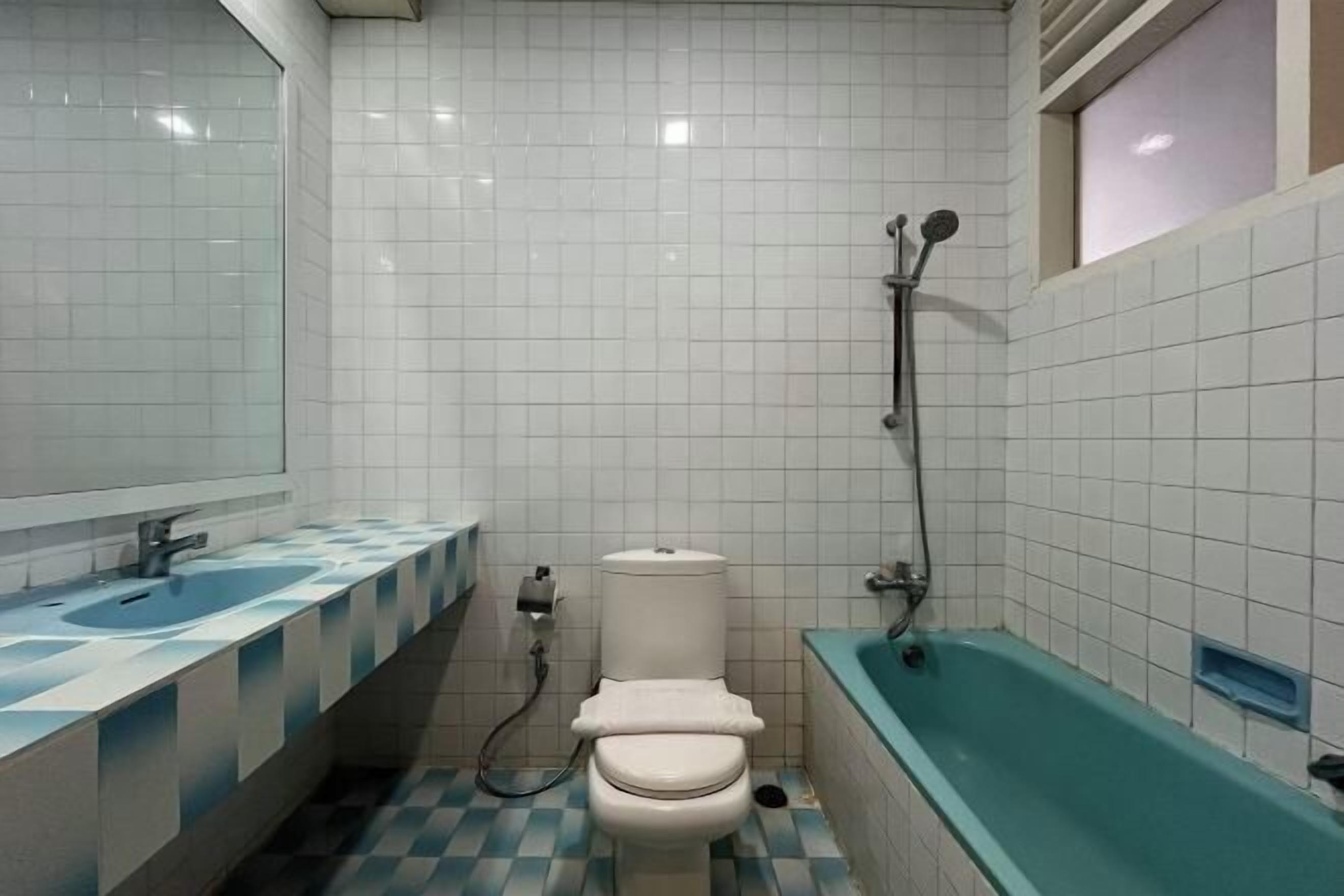 Bathroom | Rainfall showerhead, hair dryer, towels, soap