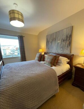 Fer et planche à repasser, draps fournis