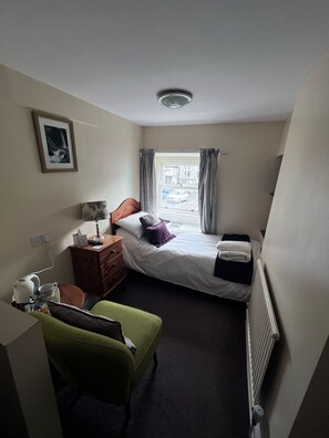 Fer et planche à repasser, draps fournis