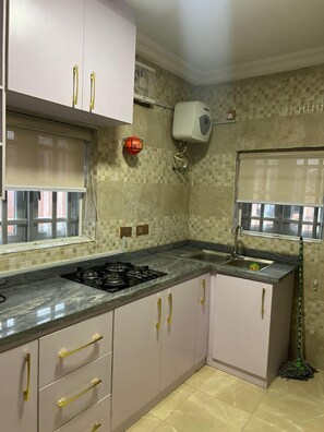 Mini-fridge, microwave, oven, stovetop