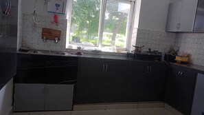 Fridge, microwave, oven, coffee/tea maker