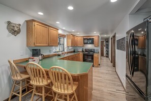 House, 2 Bedrooms | Private kitchen | Fridge, coffee/tea maker, electric kettle, toaster - Alpine Getaway 2 Bedroom Home by RedAwning (Leavenworth)