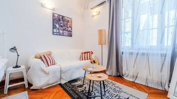 21-inch flat-screen TV with cable channels, TV