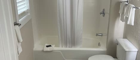 Studio Suite, Multiple Beds | Bathroom | Hair dryer, towels, soap, shampoo