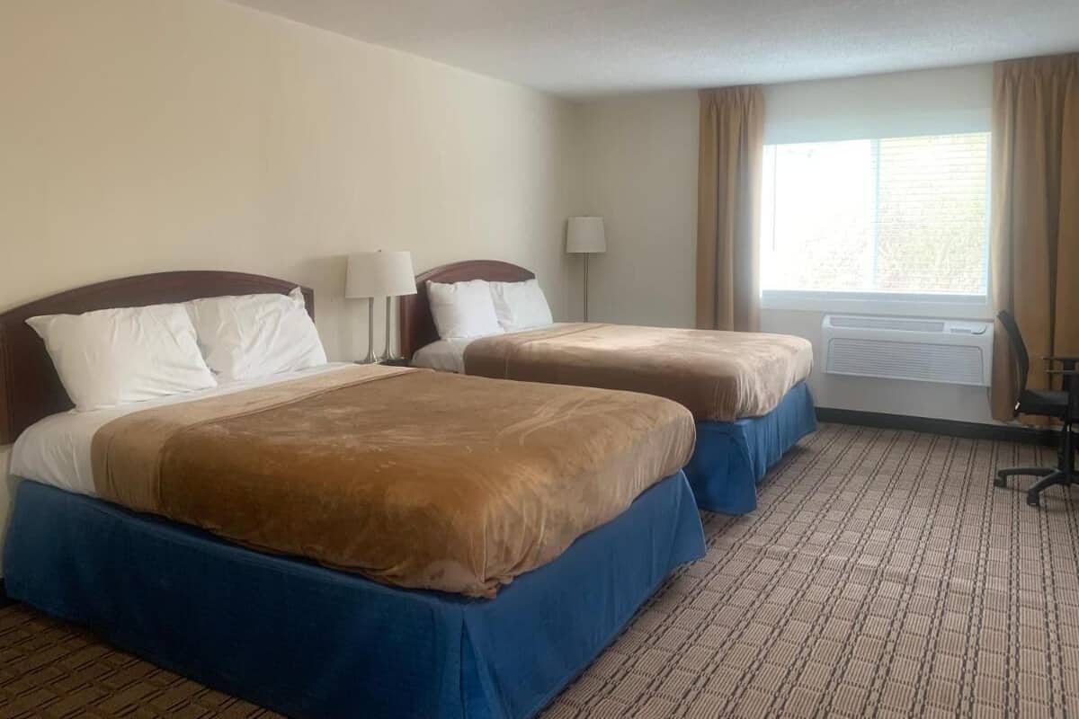 Studio Suite, Multiple Beds | Desk, laptop workspace, free WiFi, bed sheets