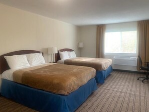 Studio suite, Meerdere bedden | Een bureau, een laptopwerkplek, gratis wifi, beddengoed