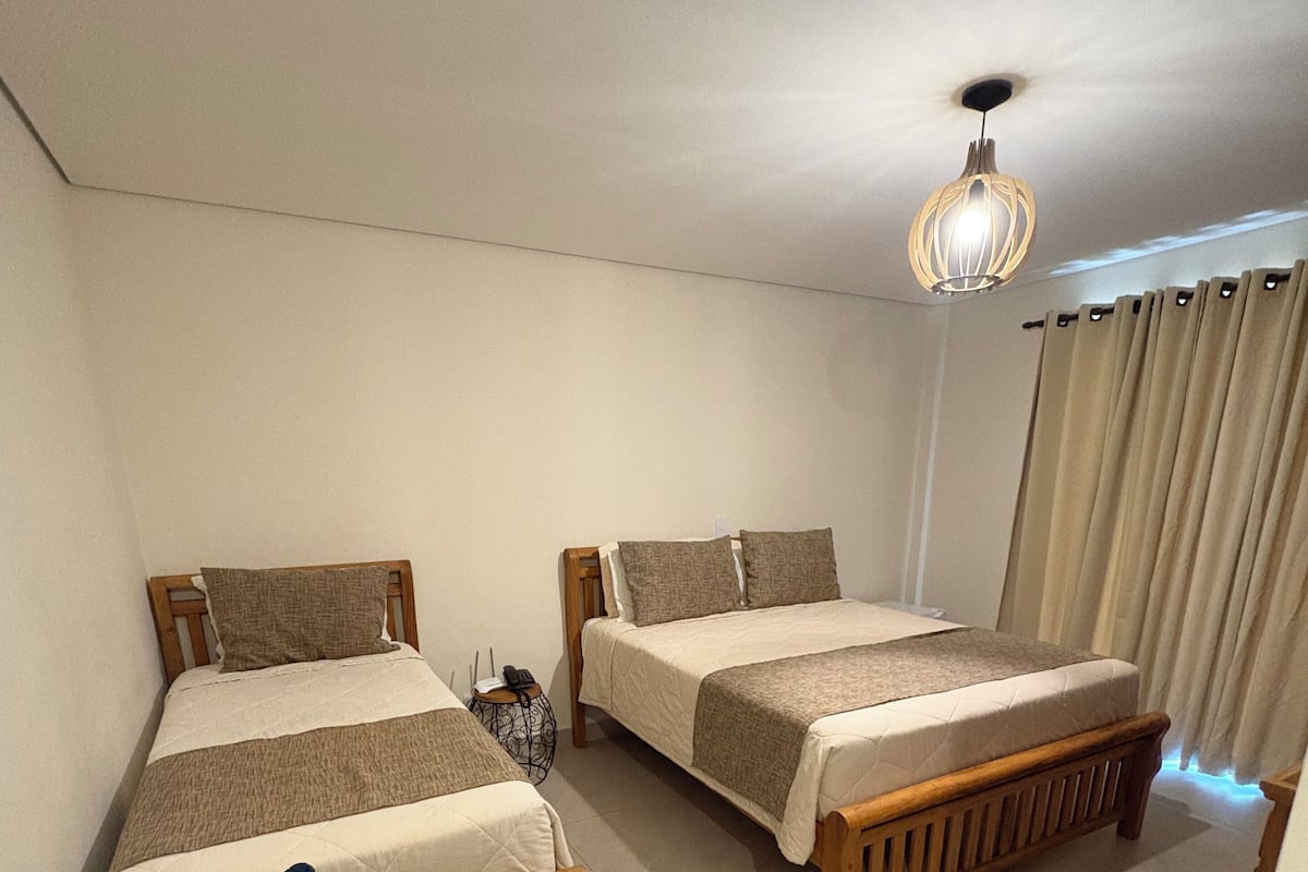 Superior Triple Room, Garden Area | Premium bedding, minibar, desk, laptop workspace
