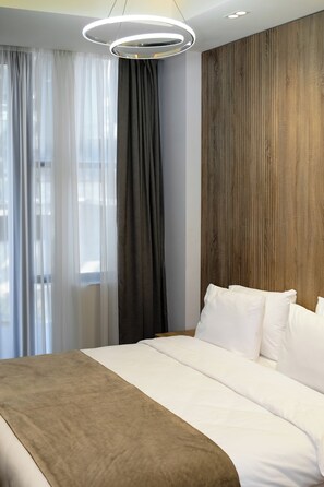 1 slaapkamer, een strijkplank/strijkijzer