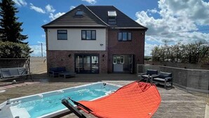 A two-story house with a swimming pool and a deck. - Branksome 4-house Sleeps 8 With Hot Tub & Parking (Worcester)