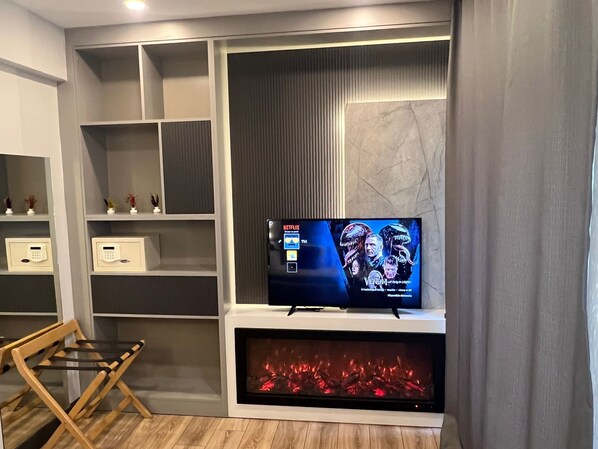 Standard Double Room, Balcony, City View | Living area | 54-inch Smart TV with satellite channels