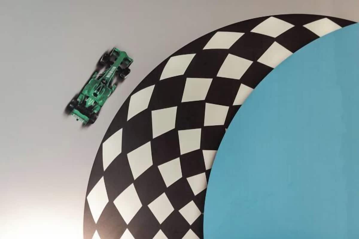 A checkered pattern with a green object and a blue shape.