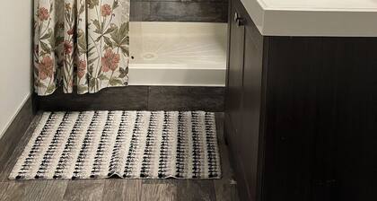 Large Furnished Basement Studio with Bathroom, WiFi, AC, and Parking in Stamford