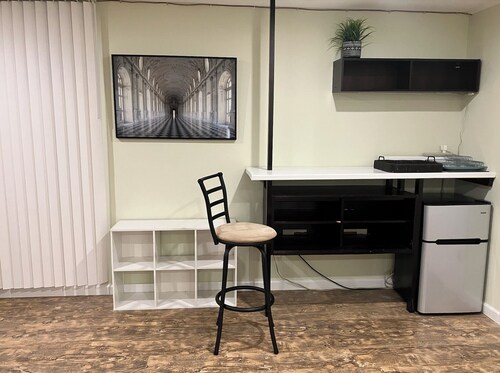 Large Furnished Basement Studio with Bathroom, WiFi, AC, and Parking in Stamford