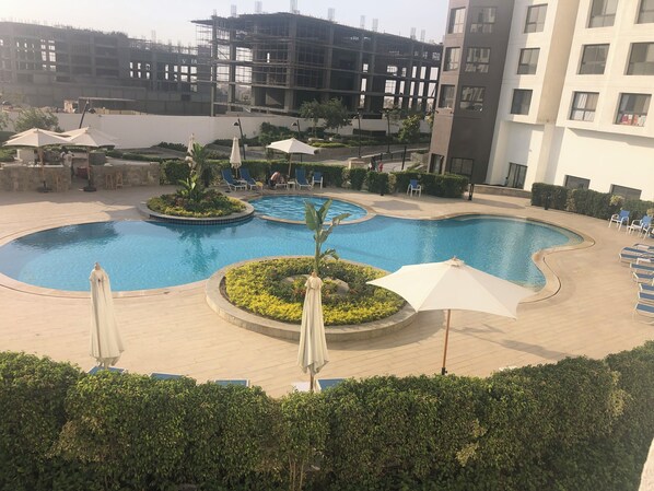 Pool - Charming 2-bedroom apartment with pool view WiFi and AC in lovely New Cairo City (New Cairo City)