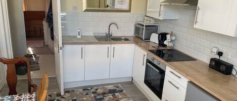 Een magnetron, een oven, een kookplaat