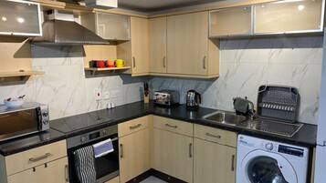 Apartment | Private kitchen | Fridge, microwave, oven, stovetop