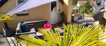 "Le Rooftop de la fontaine", in a quiet, green setting