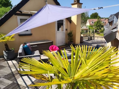 "Le Rooftop de la fontaine", in a quiet, green setting