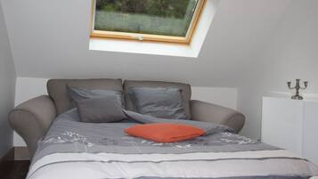 1 bedroom, desk, iron/ironing board, travel crib