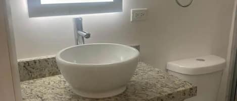 Hair dryer, towels, soap, shampoo