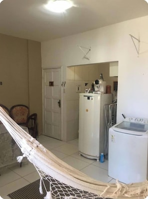Full-size fridge, oven, cookware/dishes/utensils