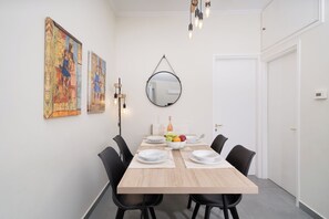 Luxury House | Living area | 32-inch TV with cable channels