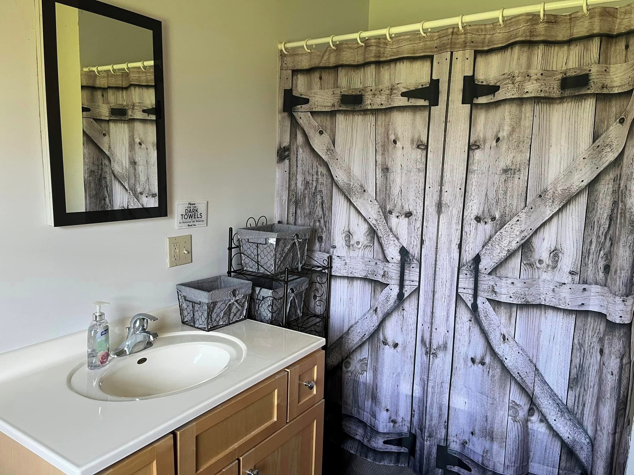 Shower, jetted tub, towels, soap