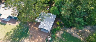 Enid Lake's charming 3-bedroom cabin with WiFi and AC in quaint Plum Point