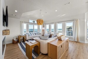 Smart TV, fireplace, books, stereo