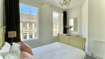 2 bedrooms, desk, iron/ironing board, travel crib