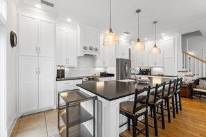 kitchen island with four barstools