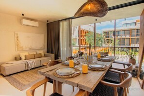 Premier Apartment, 2 Bedrooms, Pool View | Living room | Smart TV, Netflix, streaming services - Muunek by Landboutique (Tulum)
