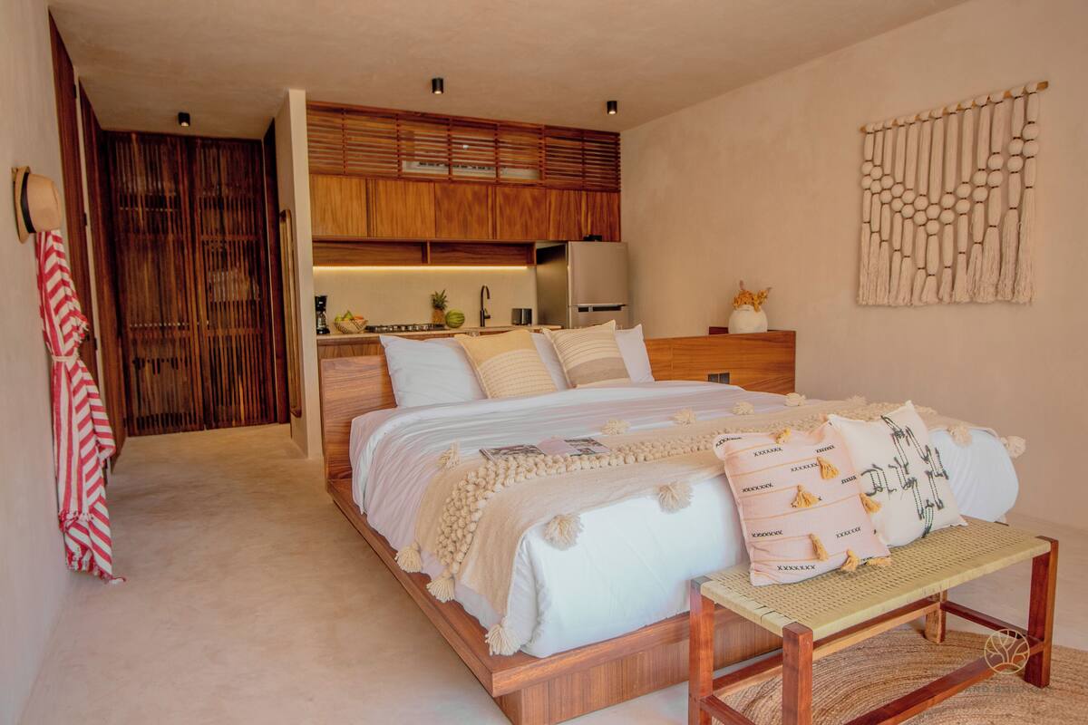 Economy Studio, 1 King Bed, Balcony, Pool View | Laptop workspace, WiFi (free), bed sheets