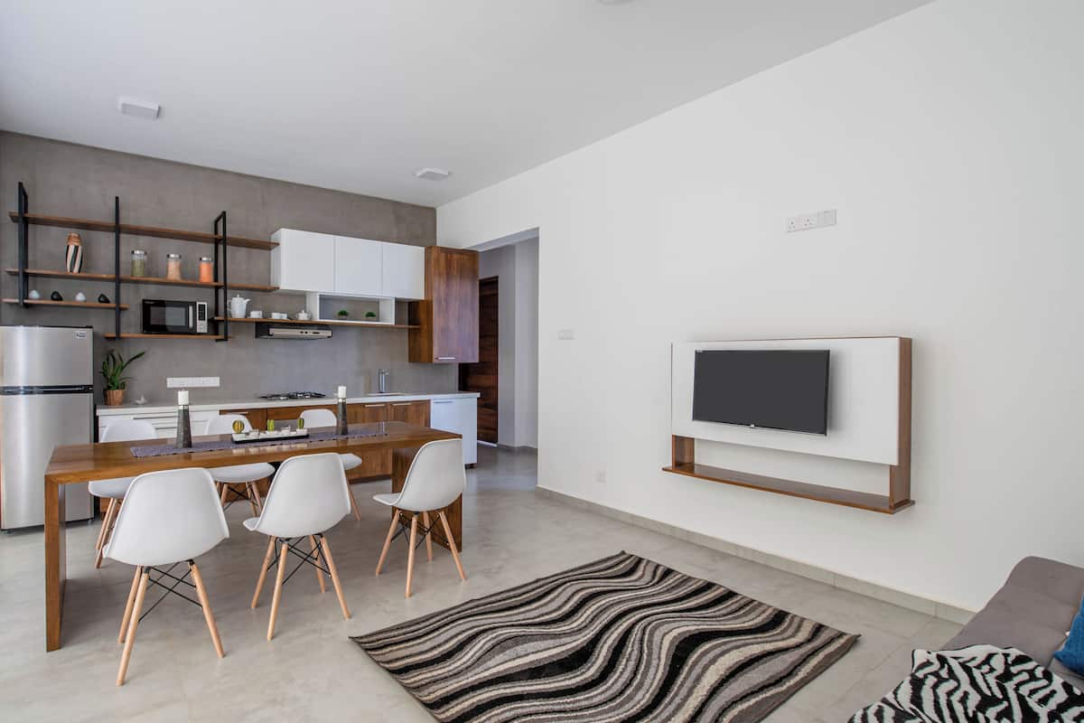 Luxury Apartment, 3 Bedrooms, Canal View | Living area | 42-inch LED TV with satellite channels