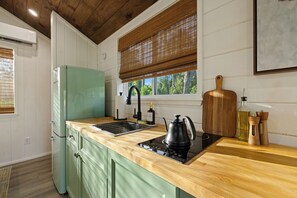 Fridge, microwave, stovetop, coffee/tea maker