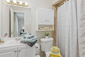 Hair dryer, towels, soap, shampoo