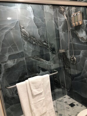 Shower, towels, soap, shampoo