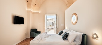 Room 'Relais Luxury Xenia - Ulivo' with Shared Pool, Wi-Fi and Air Conditioning
