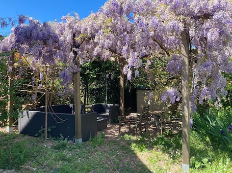 Terrace/patio. Bed and Breakfast 'Chambre Millepertuis' with Shared Terrace and Shared Garden